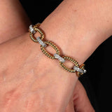 Oval Twist Link Gold Bracelet with Diamonds, .85 Carat, 14K Yellow and White Gold