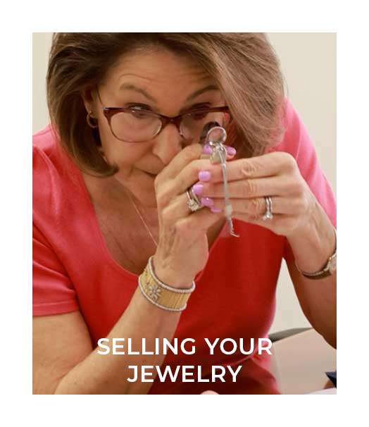 Esther inspecting jewelry quality