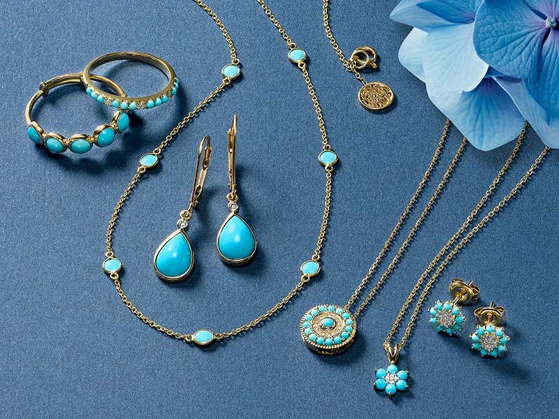 Turquoise rings, drop earrings and necklaces in yellow gold