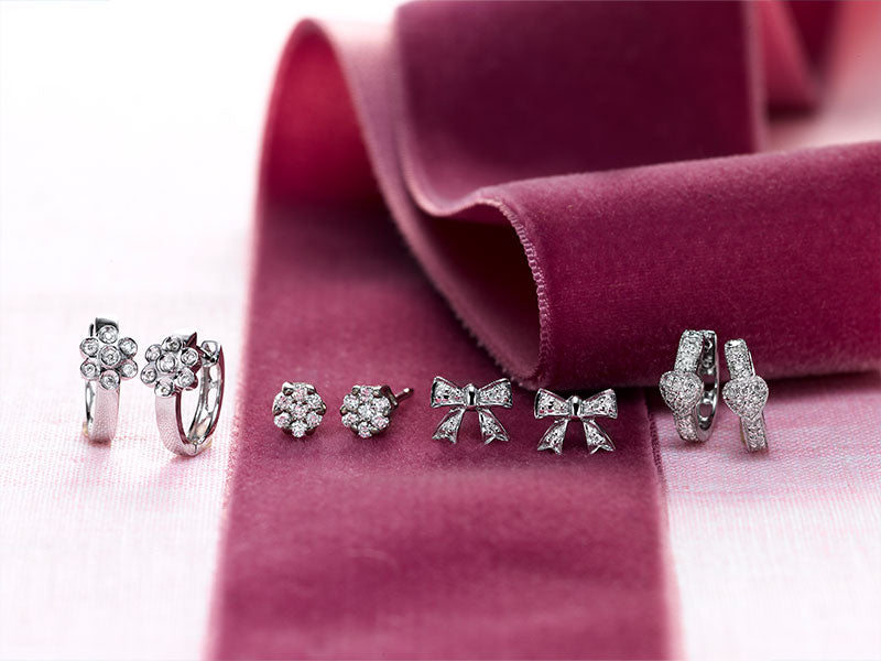 Children's diamond earrings in flower, bow and heart designs