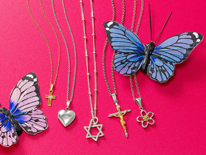 Children's pendants: cross, heart locket, Star of David, crucifix and flower