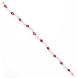 Pre-Owned Oval Ruby and Diamond Link Bracelet, 14K Yellow Gold