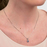 Oval Ruby and Diamond Pendant, 14K White Gold