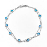 Two Strand Blue Topaz Bracelet, 7 Inches, 14K White Gold